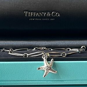 Tiffany & Co. Platinum Diamond Starfish Oval Charm Bracelet and more